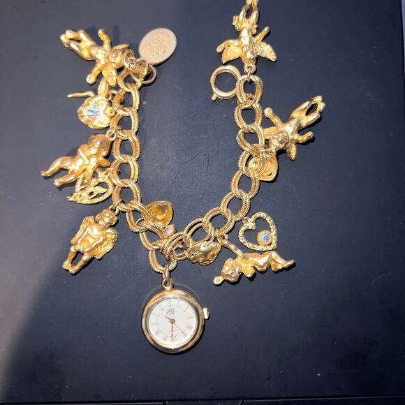 Vintage Kirks Folly Secret Of The Seven Angels Goldtone Charm Watch Bracelet SZ7 - Picture 1 of 16